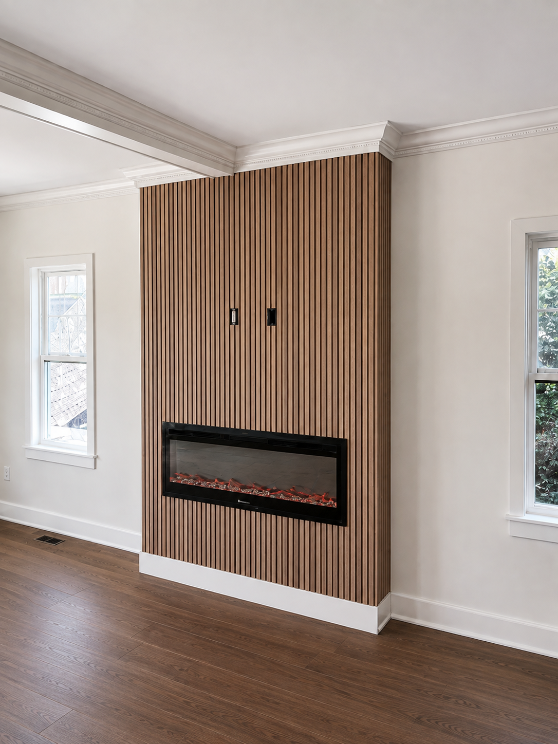 Completed fireplace wall with vertical wood slats