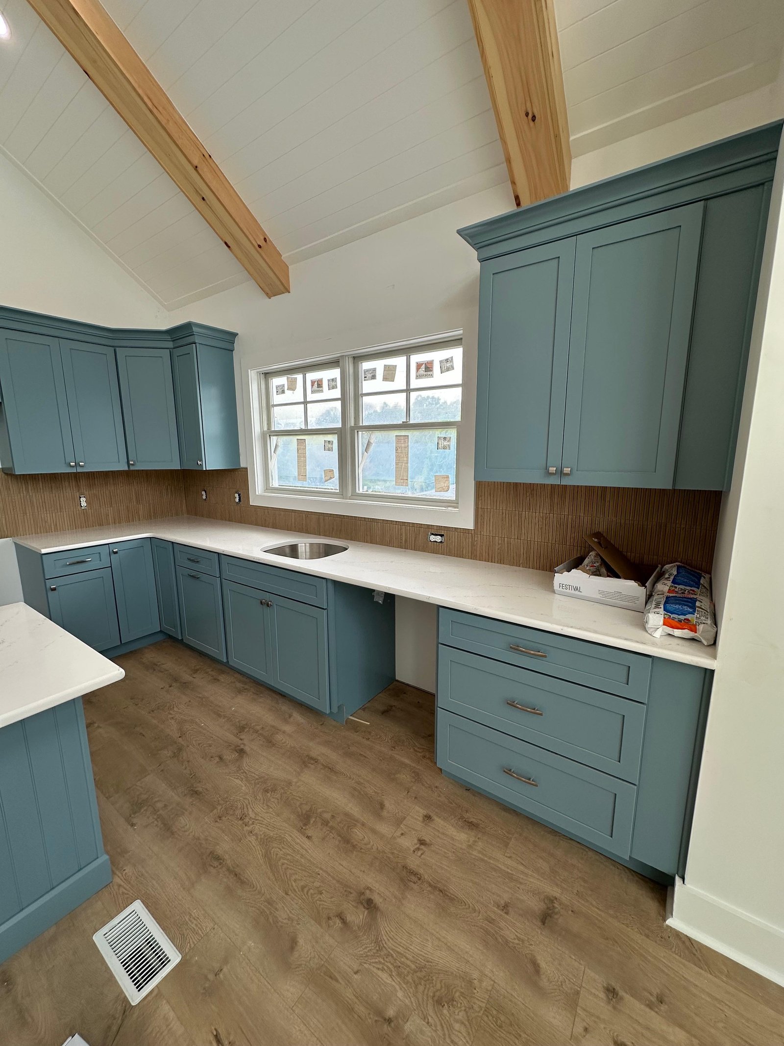 Custom kitchen cabinetry with integrated storage and clean finish details