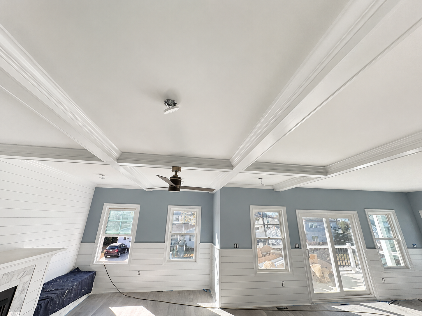 Completed coffered ceiling and shiplap finish carpentry