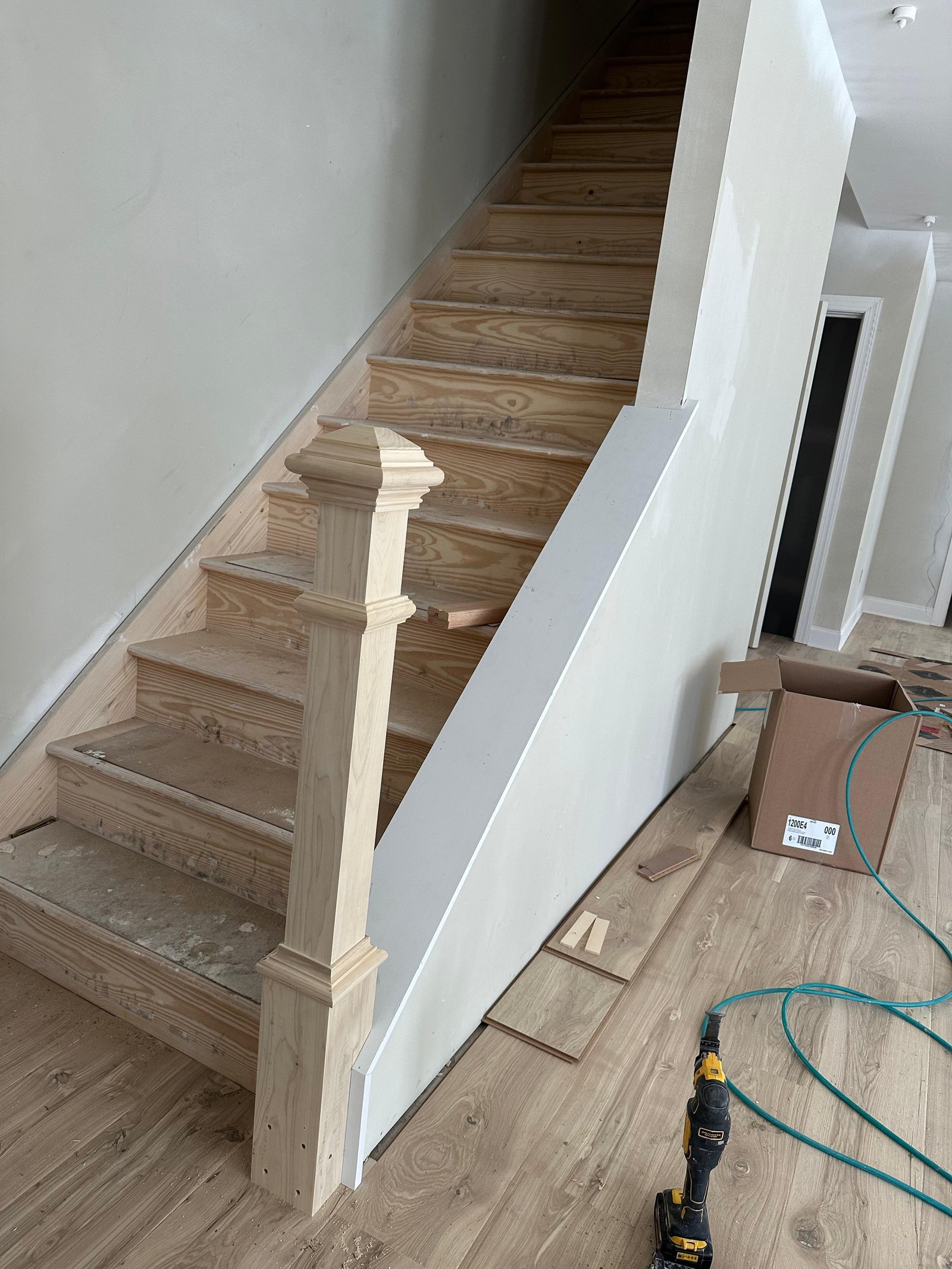 Staircase and railing installation in progress