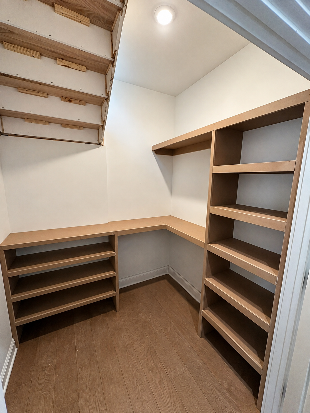 Walk-in closet shelving during installation